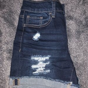 Dark blue ripped jean shorts